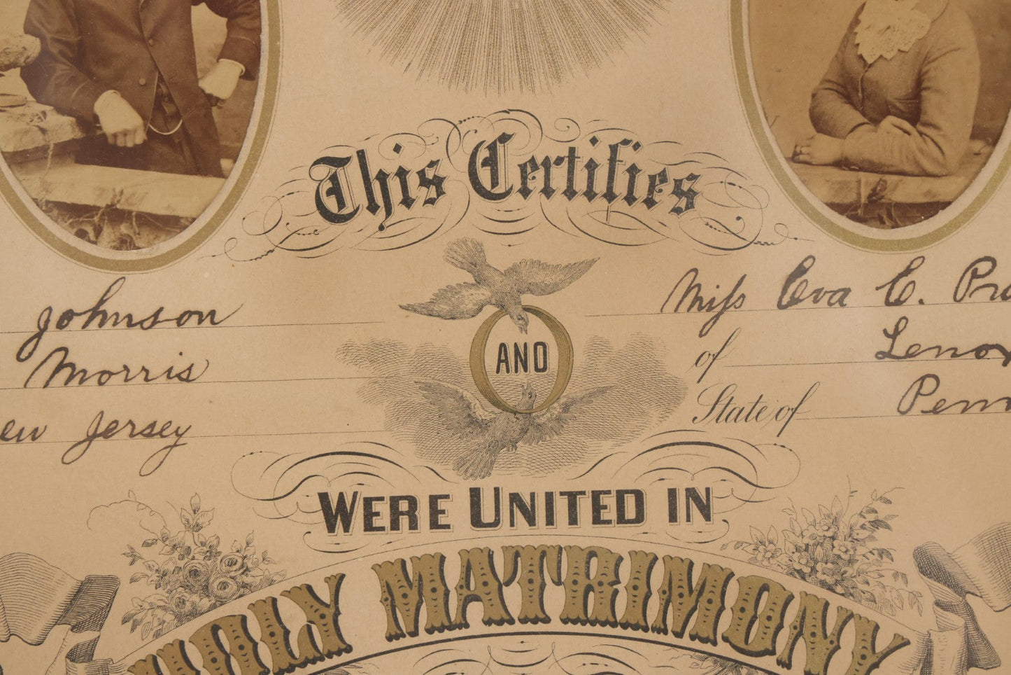 Lot 052 - Antique Lithographed Holy Matrimony Certificate For Wesley Johnson Of Port Morris New Jersey And Eva C. Pratt Of Lennox Pennsylvania, Married 1881 With Carte De Visite C.D.V. Photographs Including Pastor, In Modern Frame,  14" x 18"