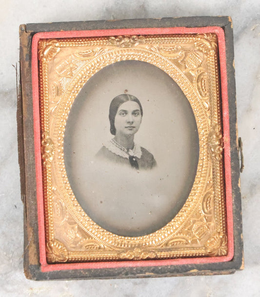 Lot 063 - Antique 1/9th Plate Tintype Photograph Of Pretty Young Woman Wearing Lace Collar And Cameo Brooch With Silvertone Background In Half Leatherette Union Case