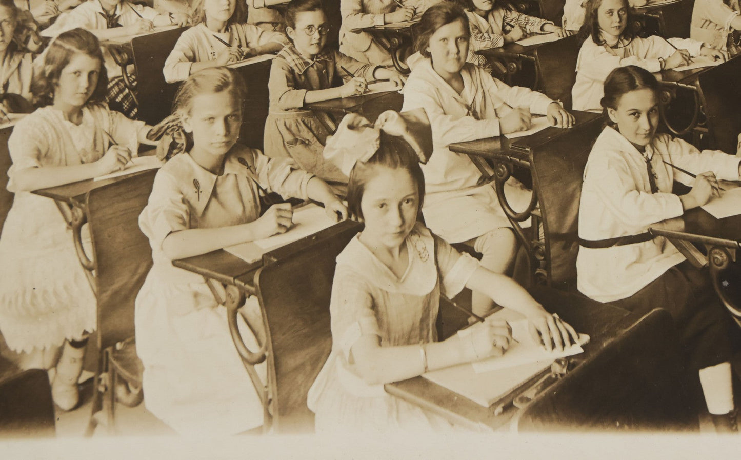 Lot 067 - Antique Boarded Interior Schoolroom Photograph Of Class Of Girls And Their Teacher (6th Grade), April 29, 1921, Partial Identification On Verso