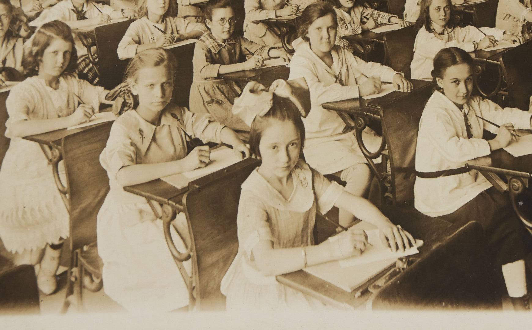 Lot 067 - Antique Boarded Interior Schoolroom Photograph Of Class Of Girls And Their Teacher (6th Grade), April 29, 1921, Partial Identification On Verso
