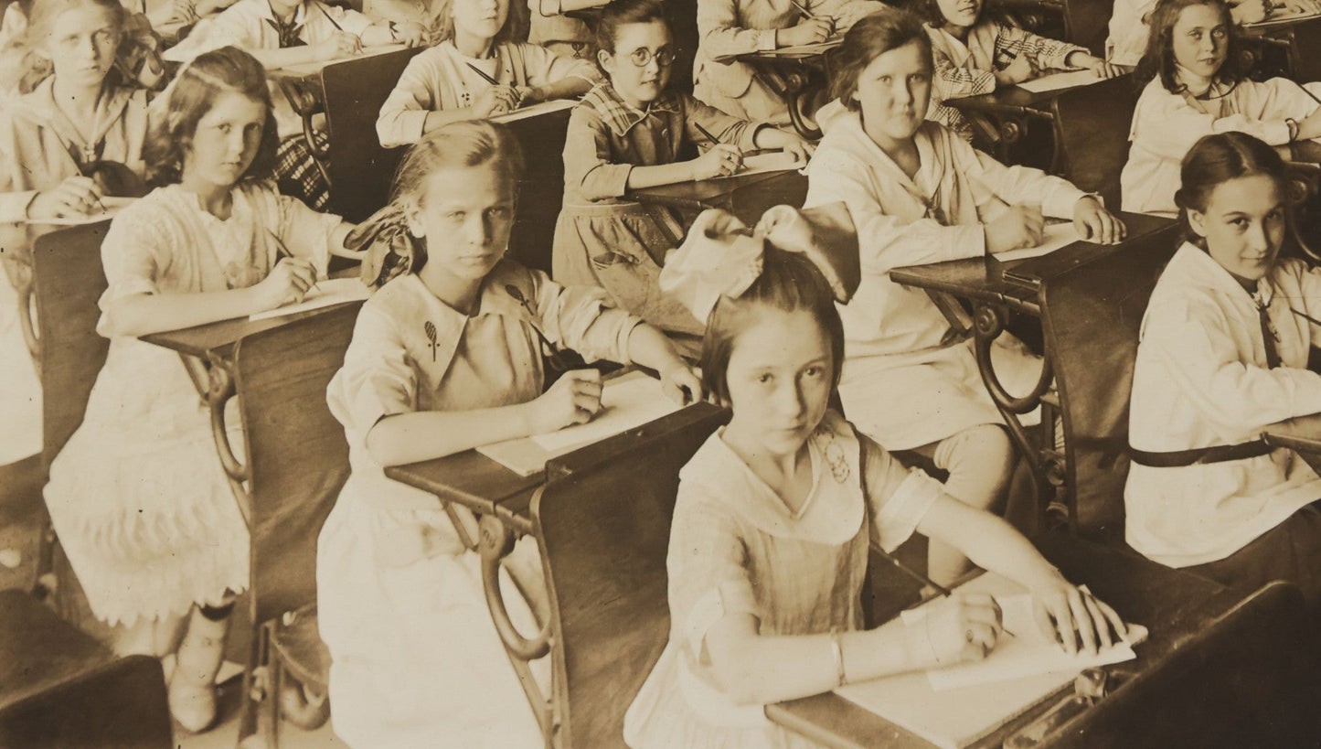 Lot 067 - Antique Boarded Interior Schoolroom Photograph Of Class Of Girls And Their Teacher (6th Grade), April 29, 1921, Partial Identification On Verso