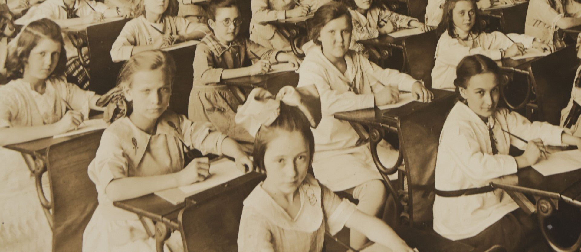 Lot 067 - Antique Boarded Interior Schoolroom Photograph Of Class Of Girls And Their Teacher (6th Grade), April 29, 1921, Partial Identification On Verso