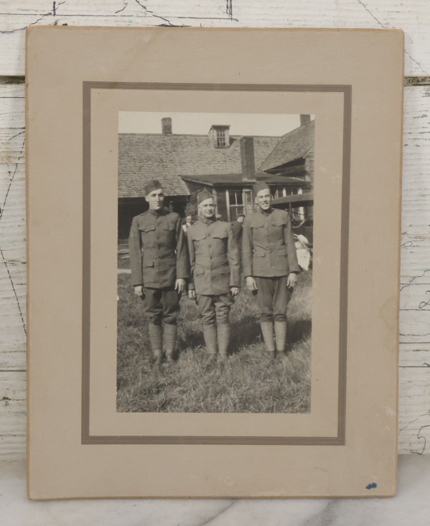 Lot 070 - Antique Boarded Photograph Of Three Smiling Doughboy WWI Soldiers, Likely Returned Home From War, Outside House