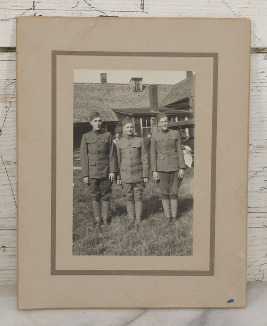Lot 070 - Antique Boarded Photograph Of Three Smiling Doughboy WWI Soldiers, Likely Returned Home From War, Outside House