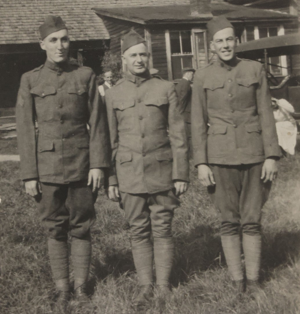 Lot 070 - Antique Boarded Photograph Of Three Smiling Doughboy WWI Soldiers, Likely Returned Home From War, Outside House