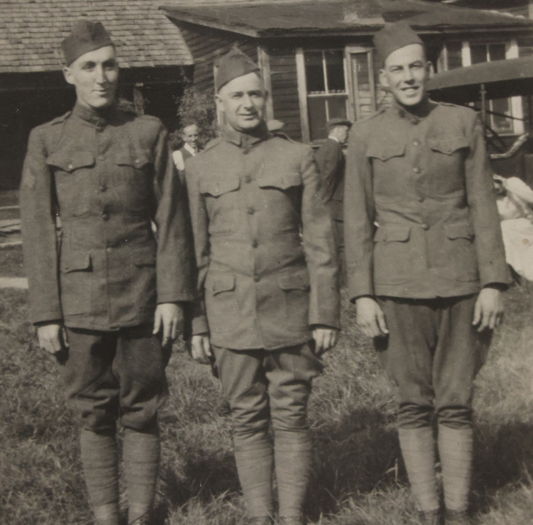 Lot 070 - Antique Boarded Photograph Of Three Smiling Doughboy WWI Soldiers, Likely Returned Home From War, Outside House