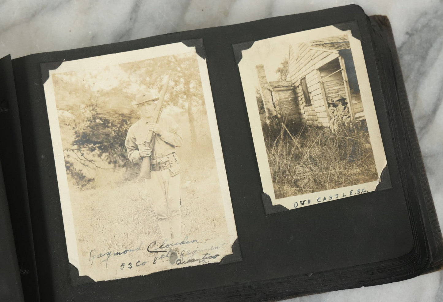 Lot 073 - Antique Snapshot Photo Album And Scrapbook With Black Cover Featuring Many Photos Of Military Men, Dogs, Hunting, Including Boxer Bill Ritchie, Circa 1920s, Belonged To F.D. Vance, Includes Poem Clippings