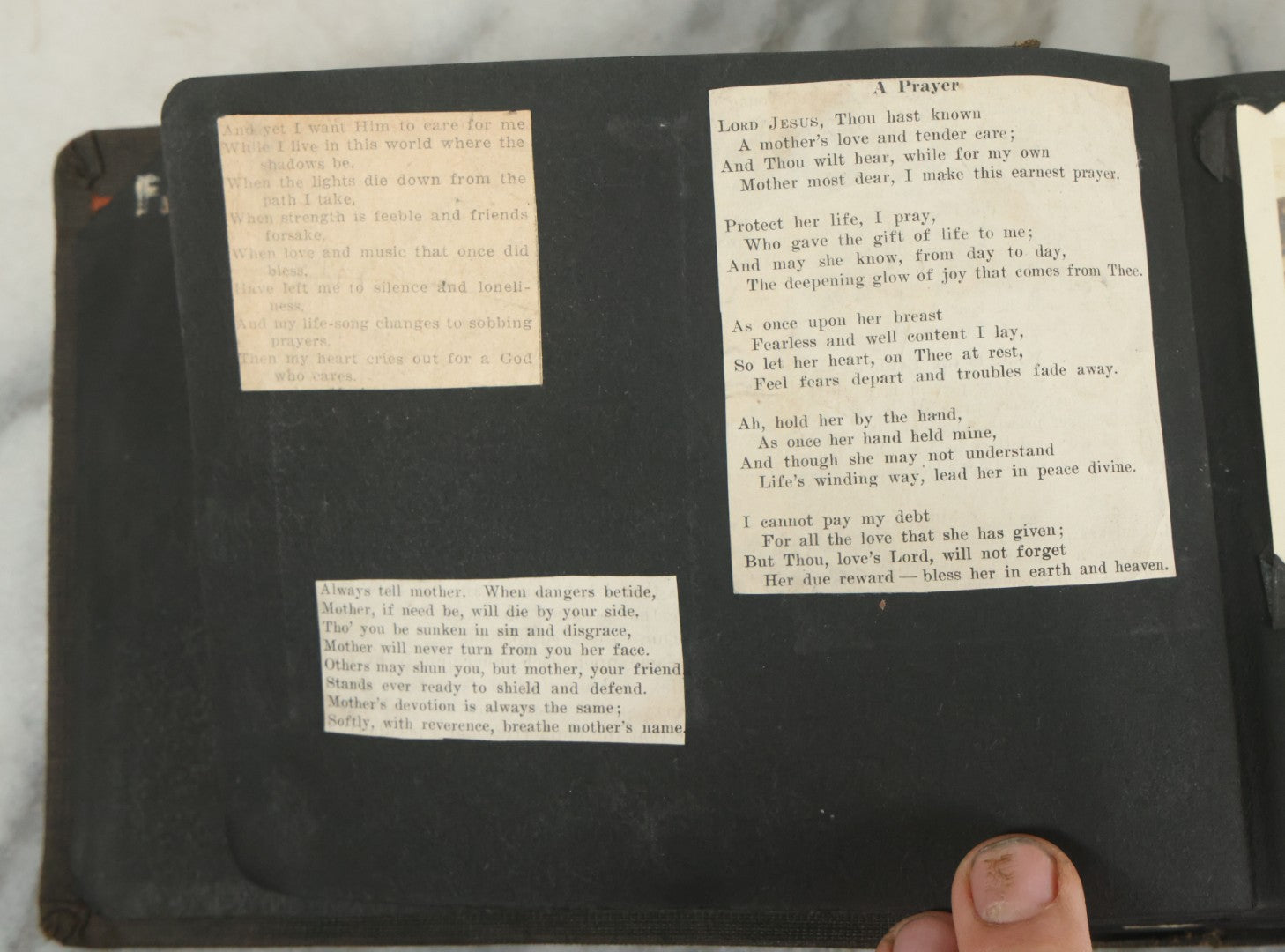 Lot 073 - Antique Snapshot Photo Album And Scrapbook With Black Cover Featuring Many Photos Of Military Men, Dogs, Hunting, Including Boxer Bill Ritchie, Circa 1920s, Belonged To F.D. Vance, Includes Poem Clippings