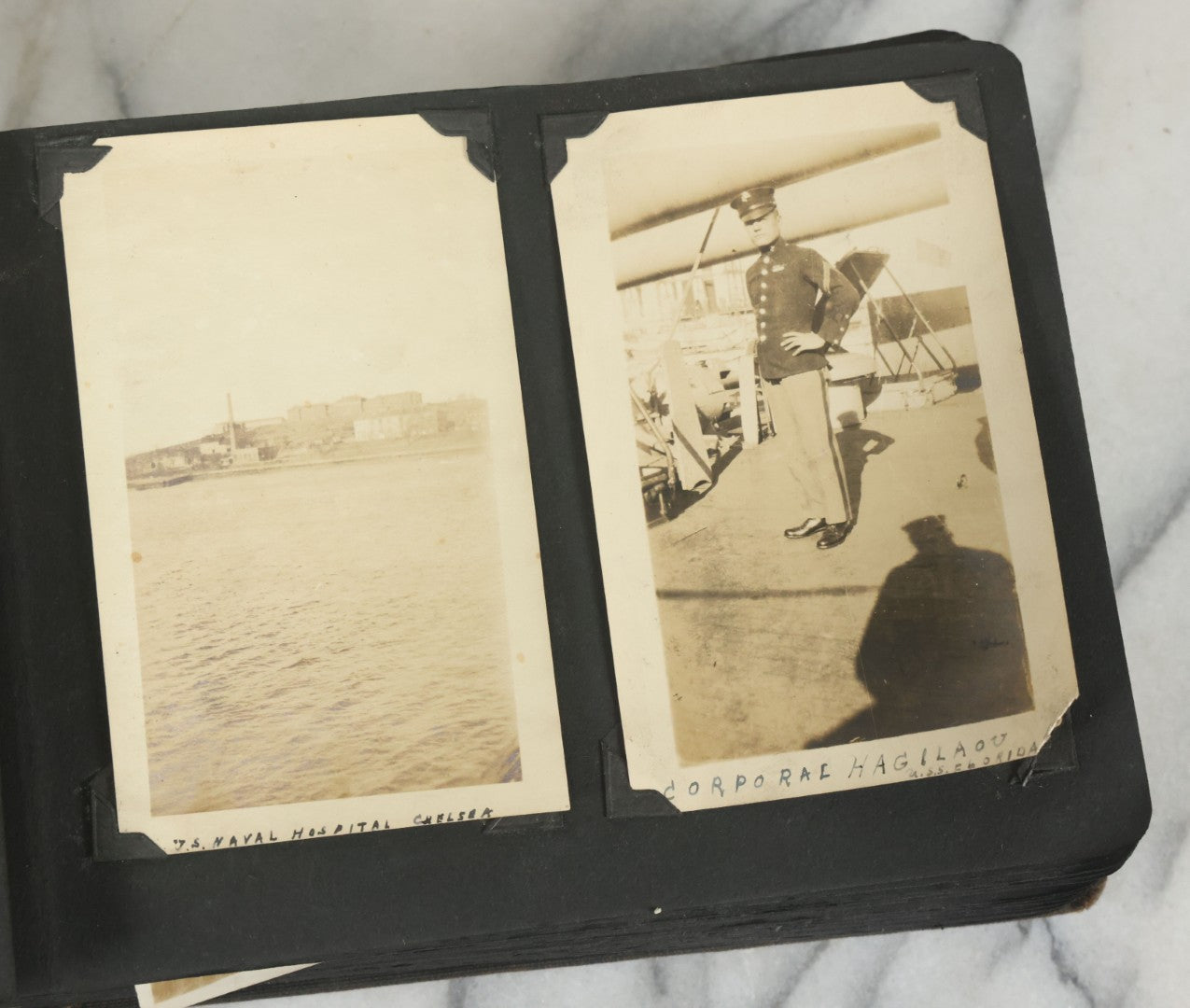 Lot 073 - Antique Snapshot Photo Album And Scrapbook With Black Cover Featuring Many Photos Of Military Men, Dogs, Hunting, Including Boxer Bill Ritchie, Circa 1920s, Belonged To F.D. Vance, Includes Poem Clippings