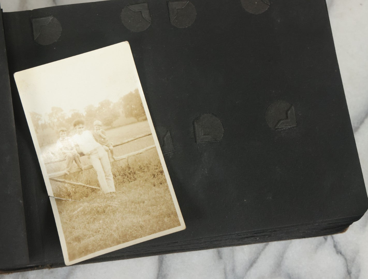 Lot 073 - Antique Snapshot Photo Album And Scrapbook With Black Cover Featuring Many Photos Of Military Men, Dogs, Hunting, Including Boxer Bill Ritchie, Circa 1920s, Belonged To F.D. Vance, Includes Poem Clippings