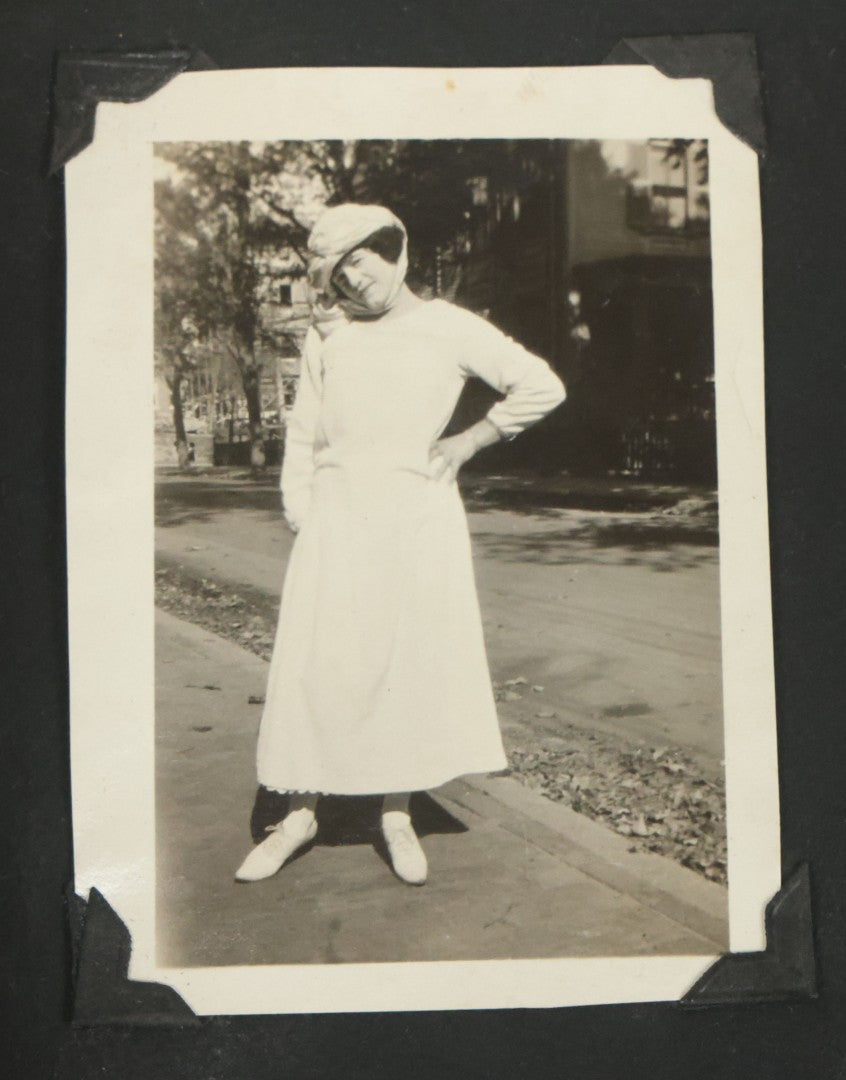 Lot 073 - Antique Snapshot Photo Album And Scrapbook With Black Cover Featuring Many Photos Of Military Men, Dogs, Hunting, Including Boxer Bill Ritchie, Circa 1920s, Belonged To F.D. Vance, Includes Poem Clippings