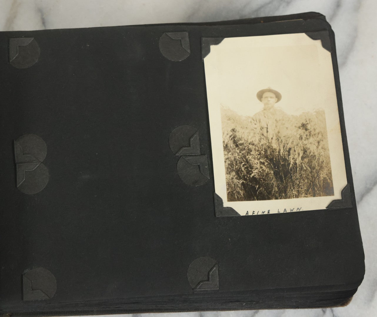 Lot 073 - Antique Snapshot Photo Album And Scrapbook With Black Cover Featuring Many Photos Of Military Men, Dogs, Hunting, Including Boxer Bill Ritchie, Circa 1920s, Belonged To F.D. Vance, Includes Poem Clippings