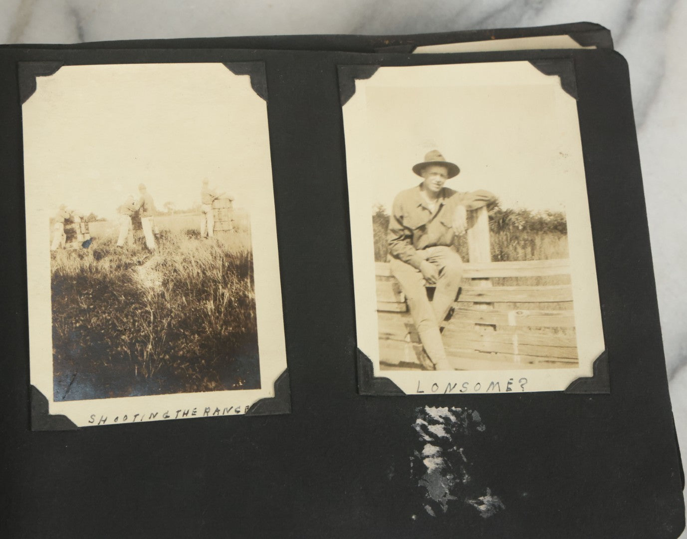 Lot 073 - Antique Snapshot Photo Album And Scrapbook With Black Cover Featuring Many Photos Of Military Men, Dogs, Hunting, Including Boxer Bill Ritchie, Circa 1920s, Belonged To F.D. Vance, Includes Poem Clippings