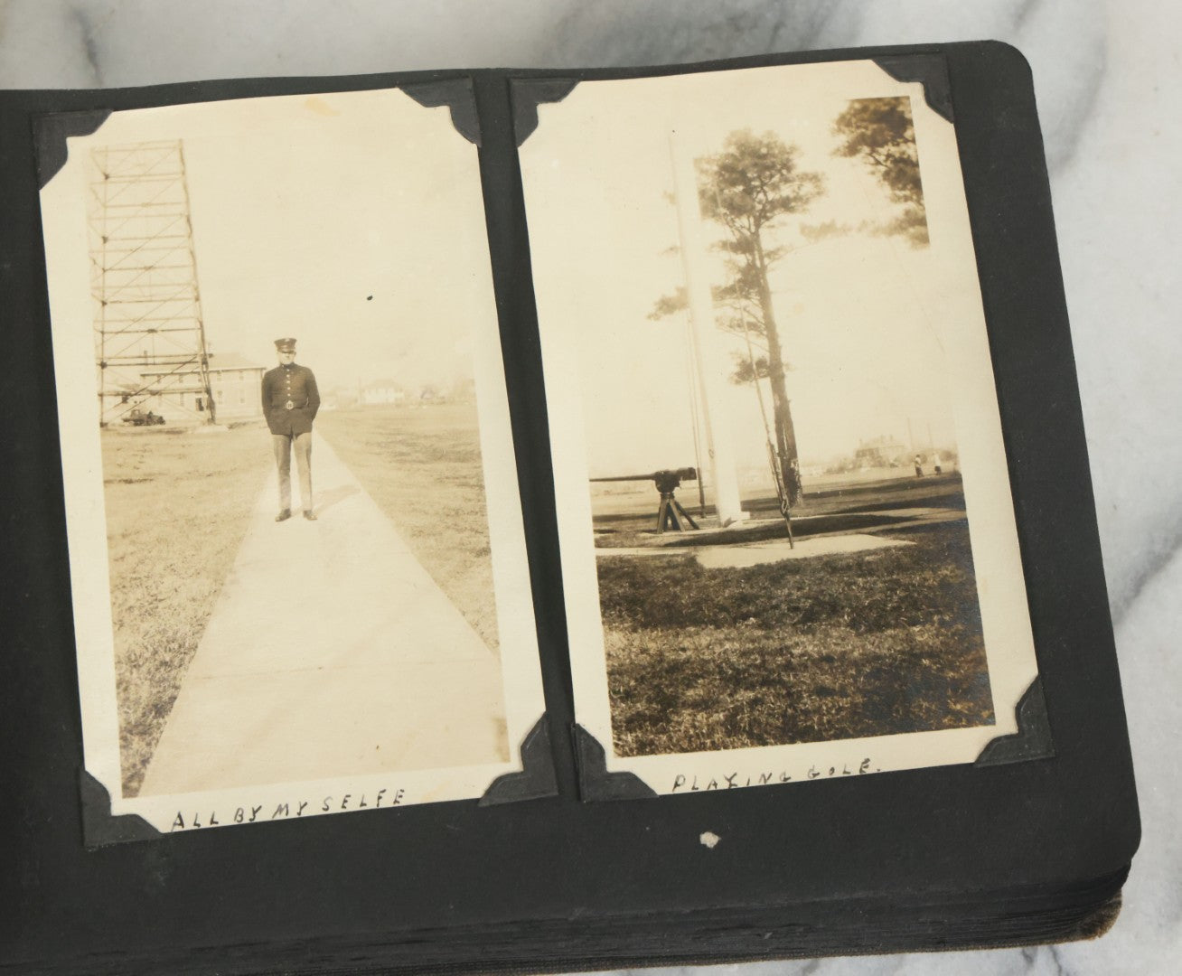 Lot 073 - Antique Snapshot Photo Album And Scrapbook With Black Cover Featuring Many Photos Of Military Men, Dogs, Hunting, Including Boxer Bill Ritchie, Circa 1920s, Belonged To F.D. Vance, Includes Poem Clippings