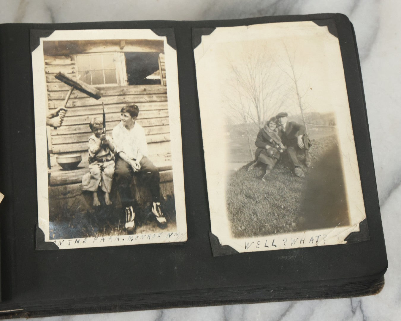 Lot 073 - Antique Snapshot Photo Album And Scrapbook With Black Cover Featuring Many Photos Of Military Men, Dogs, Hunting, Including Boxer Bill Ritchie, Circa 1920s, Belonged To F.D. Vance, Includes Poem Clippings