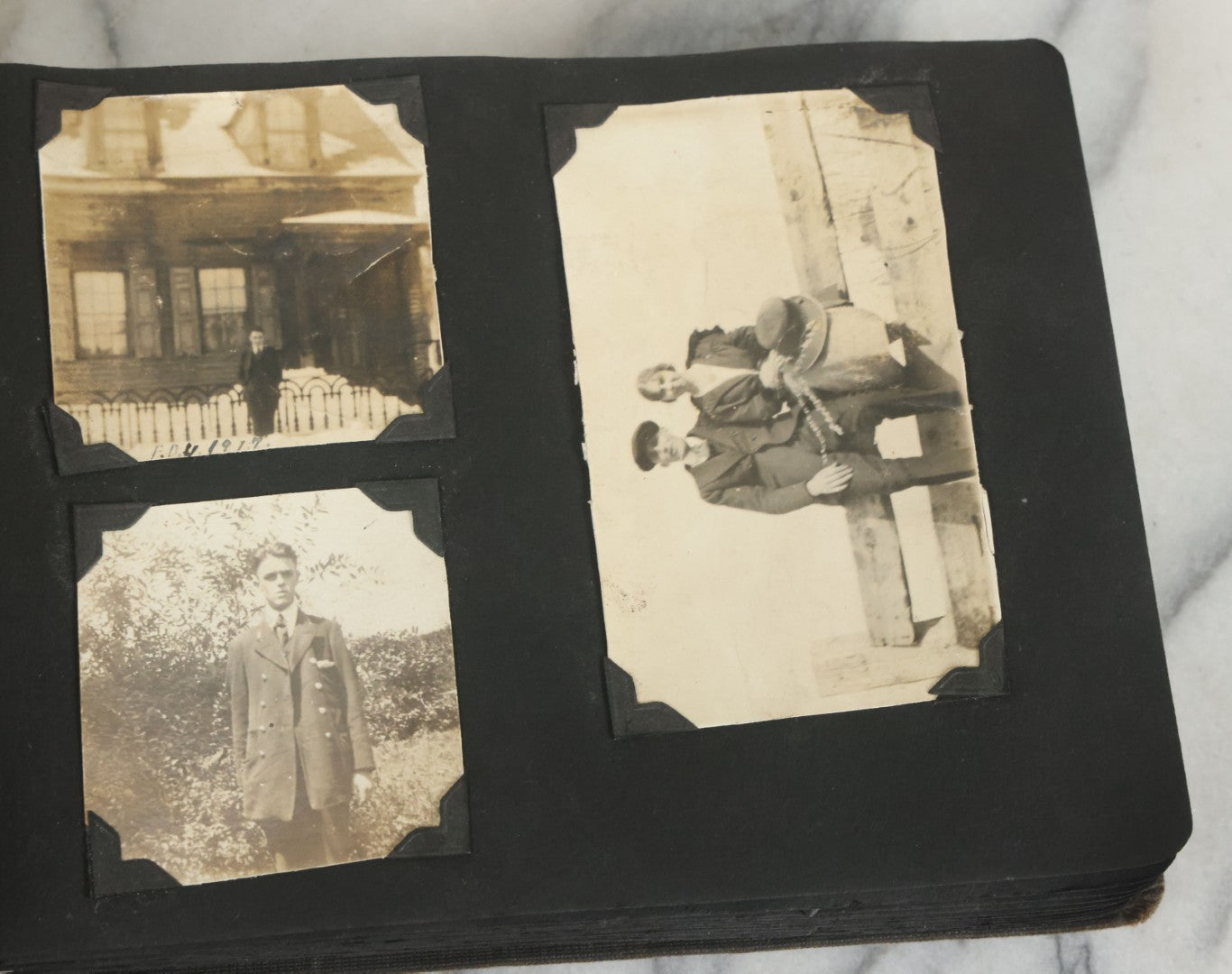 Lot 073 - Antique Snapshot Photo Album And Scrapbook With Black Cover Featuring Many Photos Of Military Men, Dogs, Hunting, Including Boxer Bill Ritchie, Circa 1920s, Belonged To F.D. Vance, Includes Poem Clippings