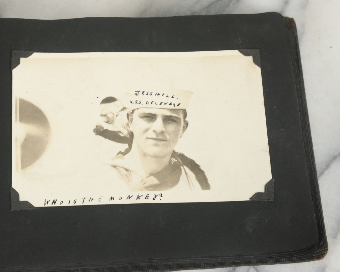Lot 073 - Antique Snapshot Photo Album And Scrapbook With Black Cover Featuring Many Photos Of Military Men, Dogs, Hunting, Including Boxer Bill Ritchie, Circa 1920s, Belonged To F.D. Vance, Includes Poem Clippings