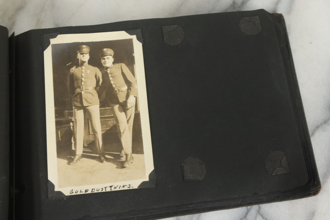 Lot 073 - Antique Snapshot Photo Album And Scrapbook With Black Cover Featuring Many Photos Of Military Men, Dogs, Hunting, Including Boxer Bill Ritchie, Circa 1920s, Belonged To F.D. Vance, Includes Poem Clippings