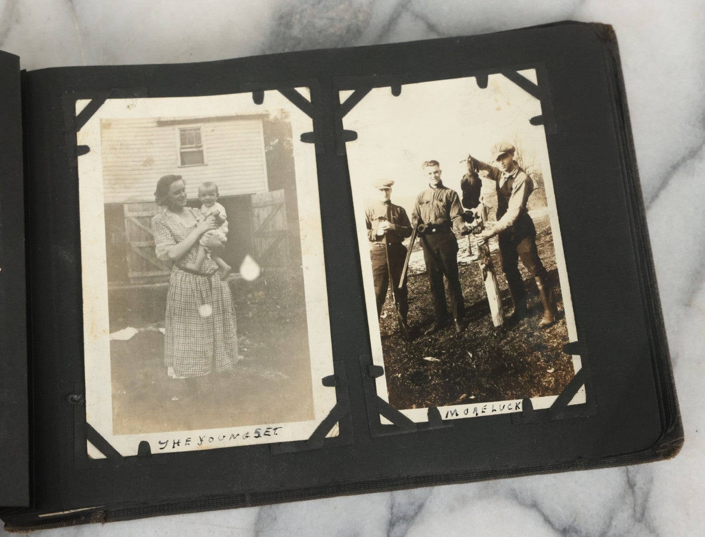 Lot 073 - Antique Snapshot Photo Album And Scrapbook With Black Cover Featuring Many Photos Of Military Men, Dogs, Hunting, Including Boxer Bill Ritchie, Circa 1920s, Belonged To F.D. Vance, Includes Poem Clippings
