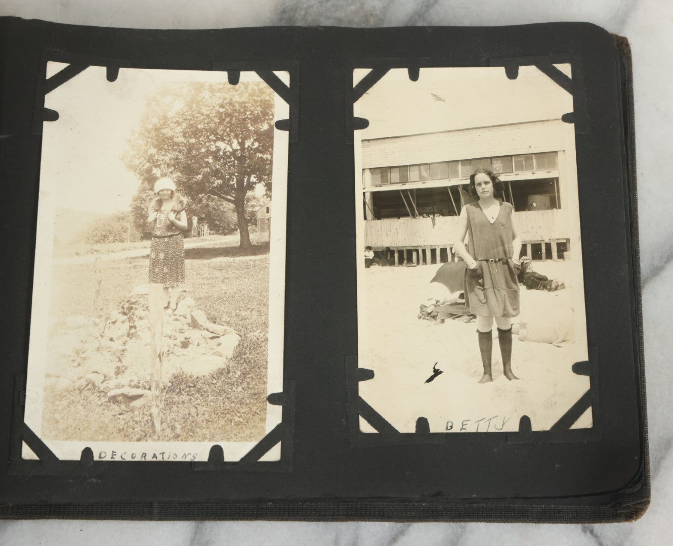 Lot 073 - Antique Snapshot Photo Album And Scrapbook With Black Cover Featuring Many Photos Of Military Men, Dogs, Hunting, Including Boxer Bill Ritchie, Circa 1920s, Belonged To F.D. Vance, Includes Poem Clippings
