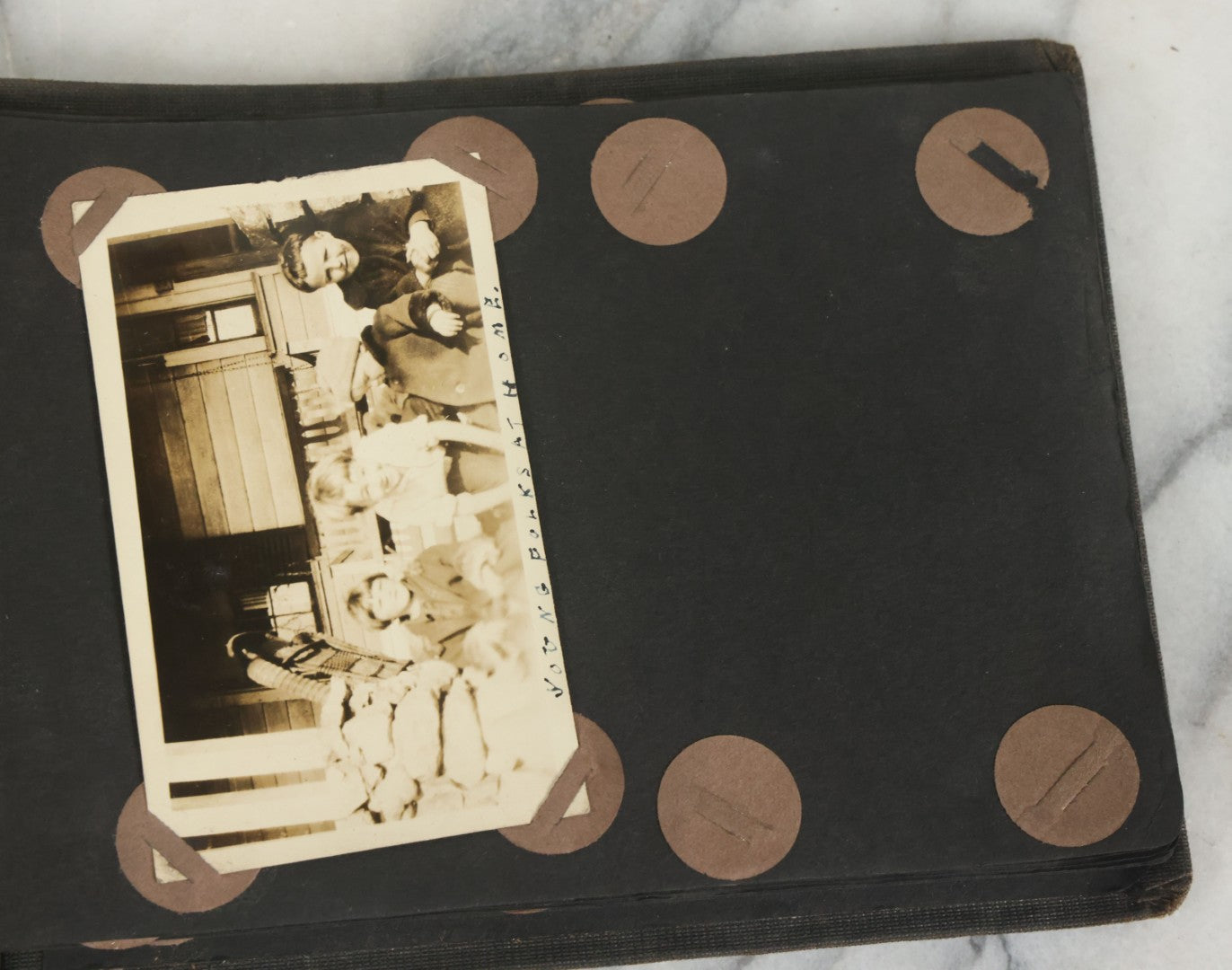 Lot 073 - Antique Snapshot Photo Album And Scrapbook With Black Cover Featuring Many Photos Of Military Men, Dogs, Hunting, Including Boxer Bill Ritchie, Circa 1920s, Belonged To F.D. Vance, Includes Poem Clippings