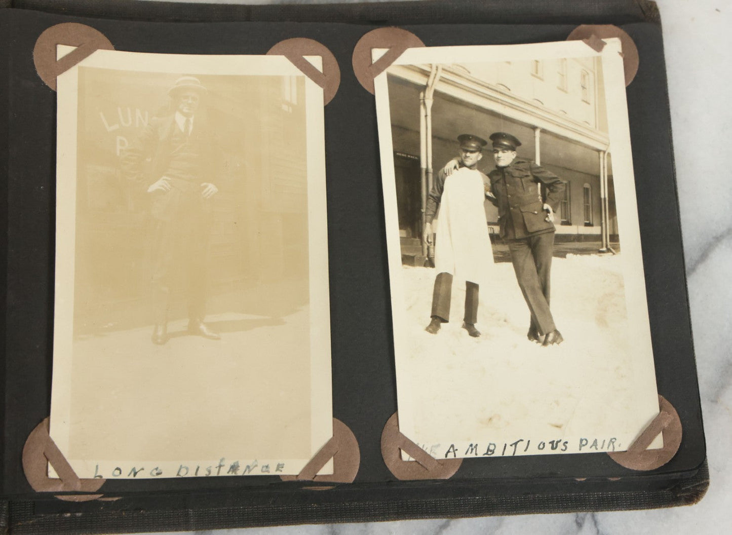 Lot 073 - Antique Snapshot Photo Album And Scrapbook With Black Cover Featuring Many Photos Of Military Men, Dogs, Hunting, Including Boxer Bill Ritchie, Circa 1920s, Belonged To F.D. Vance, Includes Poem Clippings