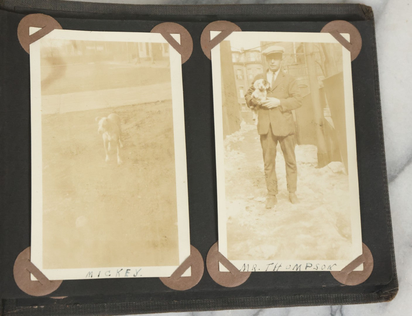 Lot 073 - Antique Snapshot Photo Album And Scrapbook With Black Cover Featuring Many Photos Of Military Men, Dogs, Hunting, Including Boxer Bill Ritchie, Circa 1920s, Belonged To F.D. Vance, Includes Poem Clippings