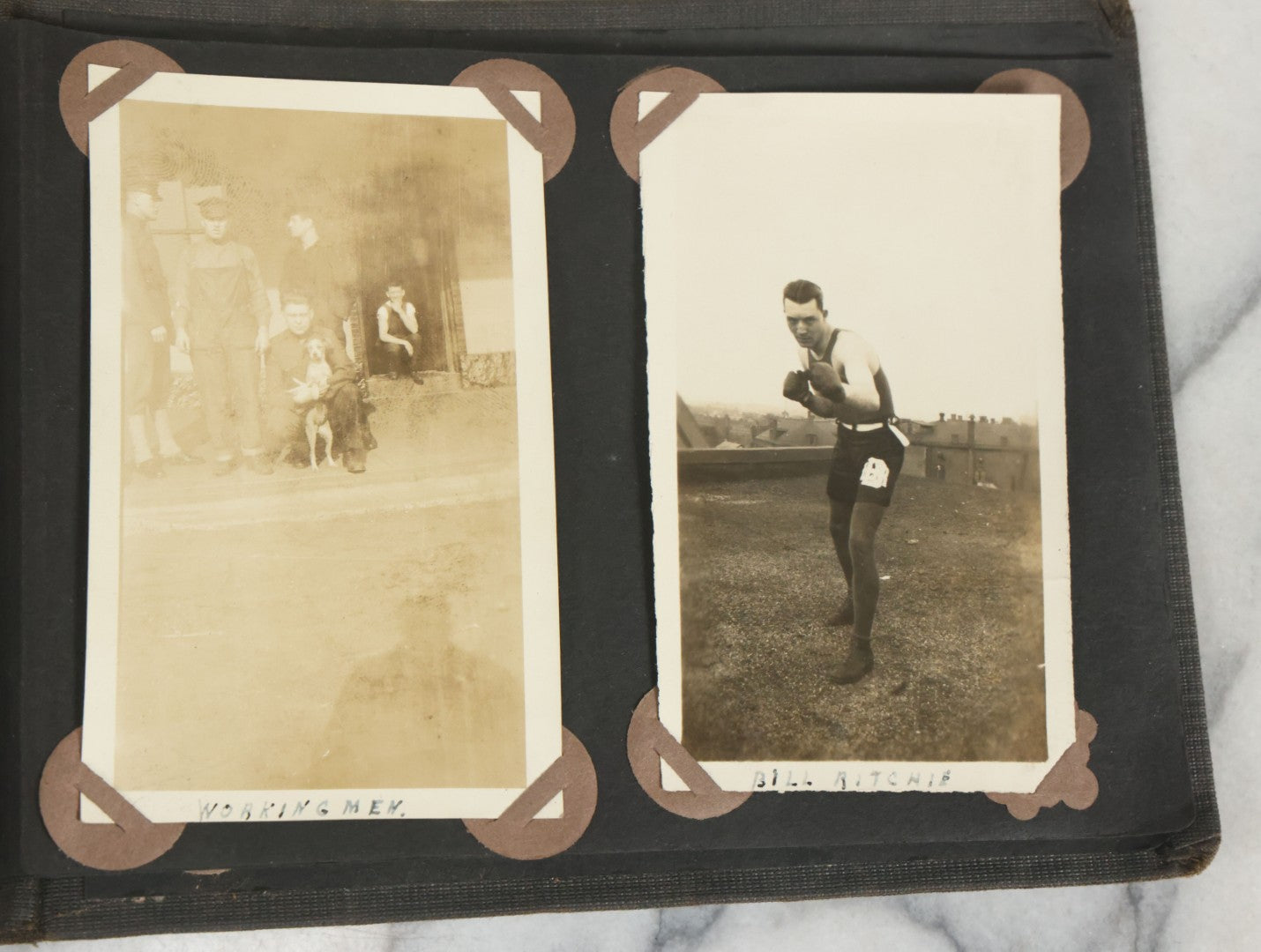 Lot 073 - Antique Snapshot Photo Album And Scrapbook With Black Cover Featuring Many Photos Of Military Men, Dogs, Hunting, Including Boxer Bill Ritchie, Circa 1920s, Belonged To F.D. Vance, Includes Poem Clippings