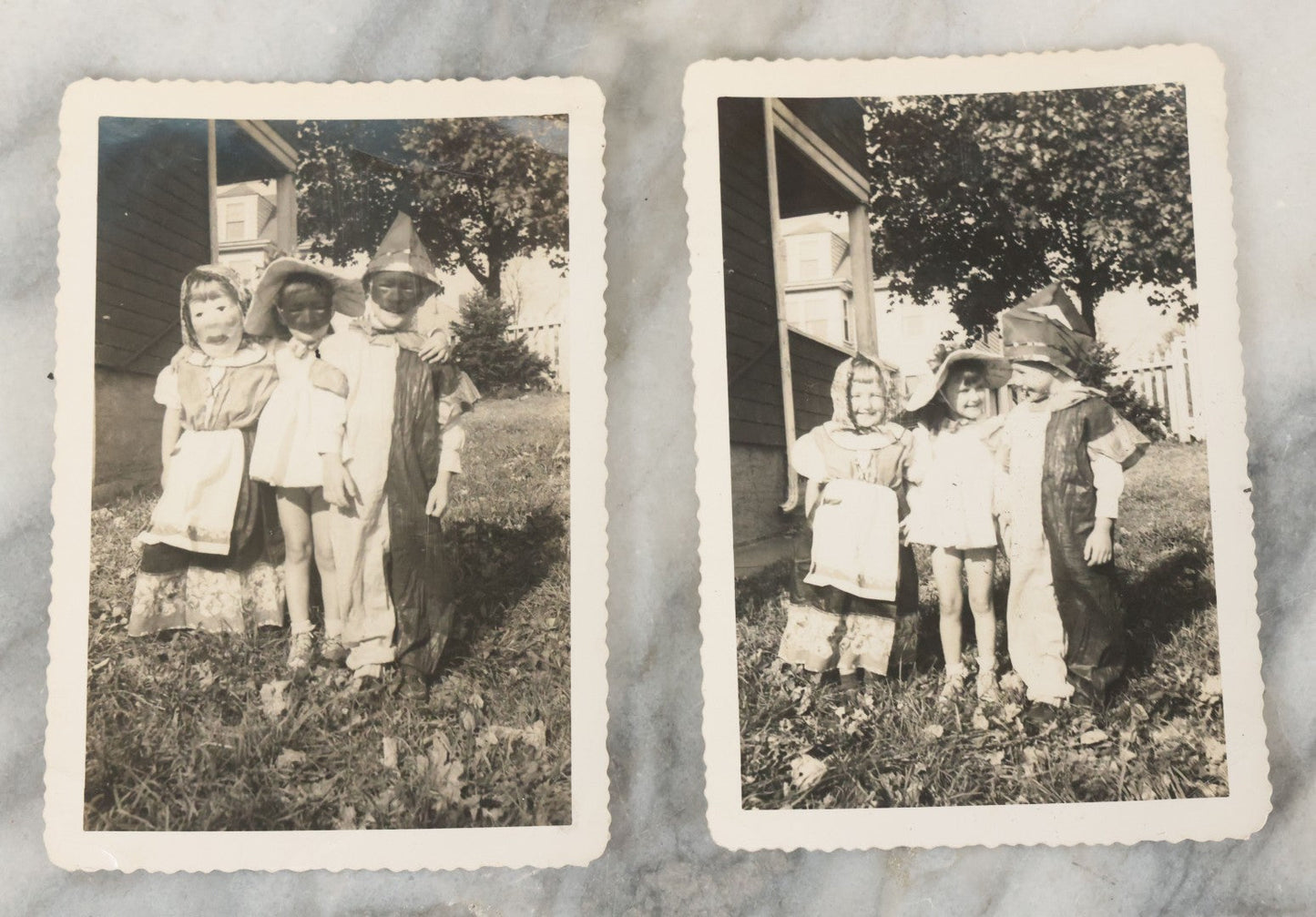 Lot 077 - Pair Of Vintage Snapshot Photographs Of 3 Children In Costume With Masks On Halloween, Circa 1944