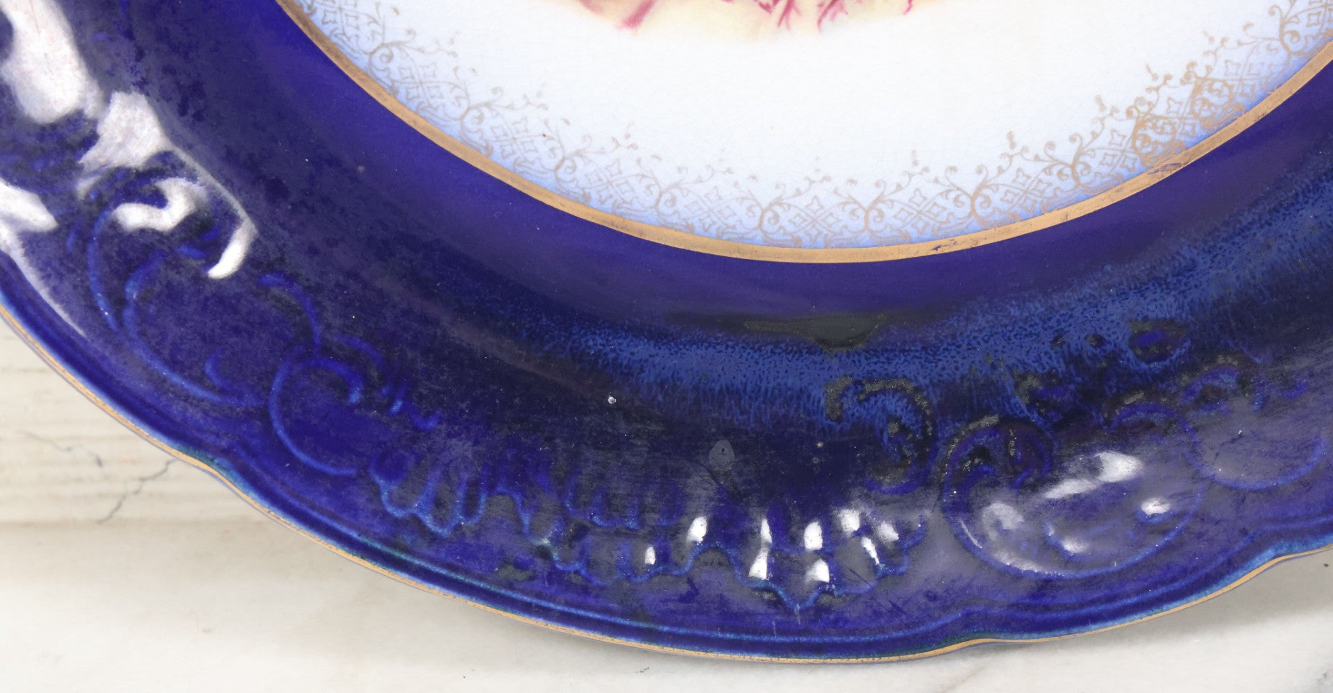 Lot 082 - Antique Decorative Transferware Plate With Blue Rim Featuring Pretty Woman With Long Brown Hair And Rose After G. Bonfits, By Royal La Belle, Wheeling Potteries Co., With Wire Hanger, 13" Diameter