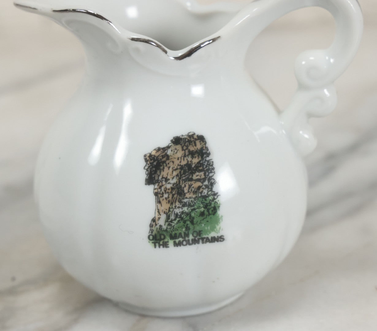 Lot 084 - Vintage Old Man Of The Mountains, White Mountains, New Hampshire, Souvenir Porcelain Creamer, 3-1/2" Height