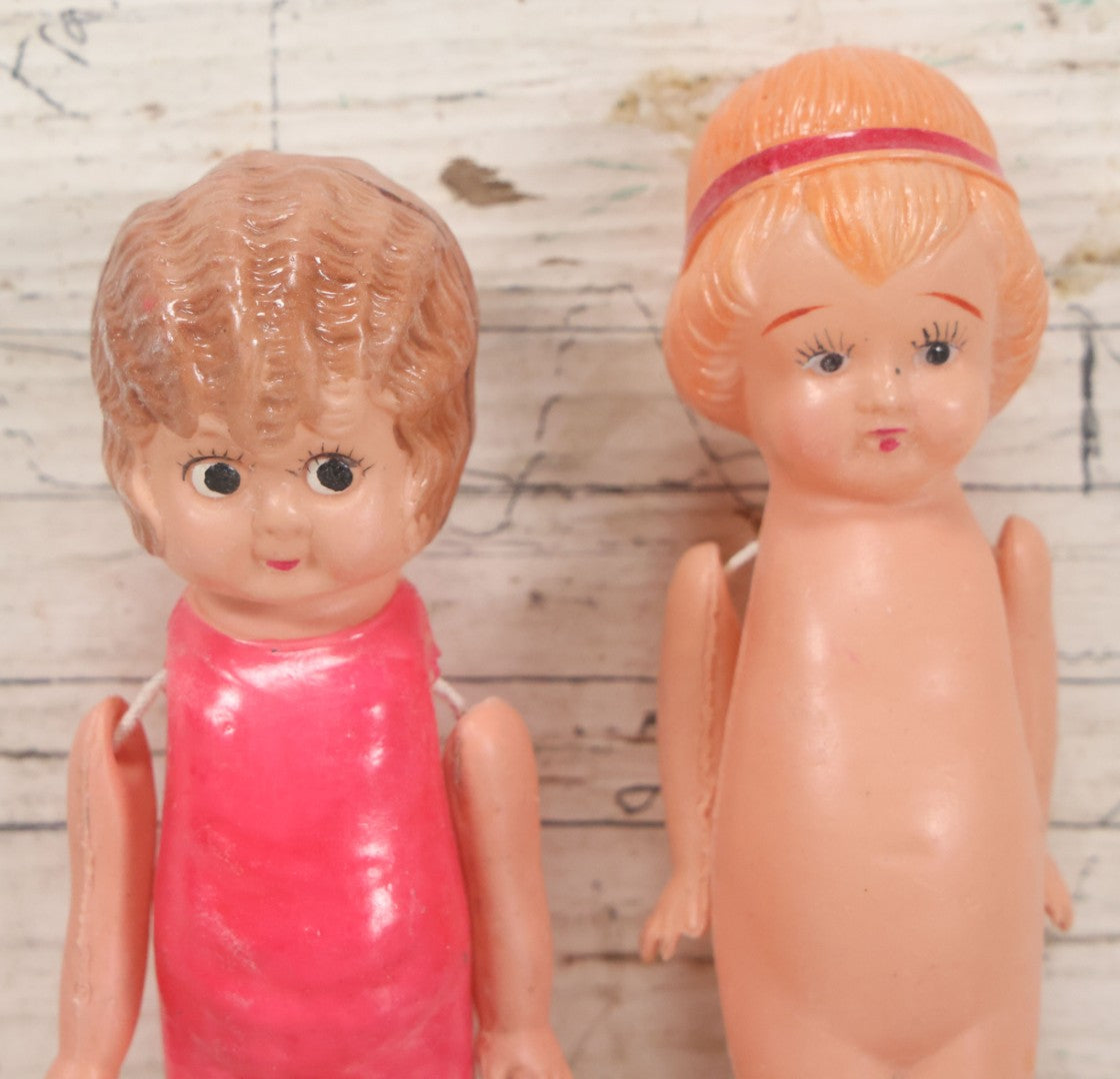 Lot 096 - Pair Of Vintage Celluloid Flapper Dolls, Made In Japan, One With Pink Headband And One With Pink Swimsuit