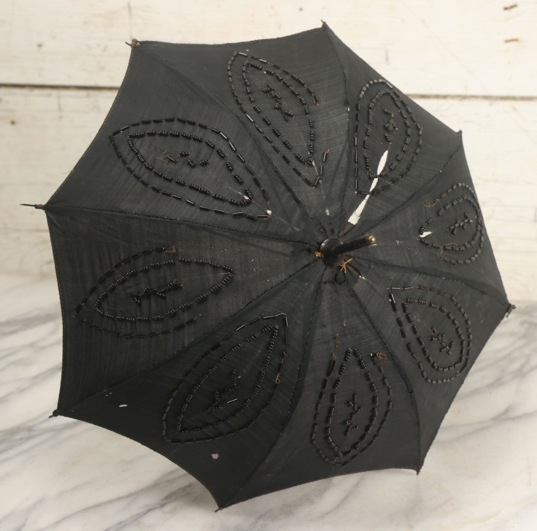 Lot 016 - Antique Petite Size Black Beaded Parasol Umbrella With Carved Wooden Handle, Note Holes, Wear, Overall Length 22-1/4"