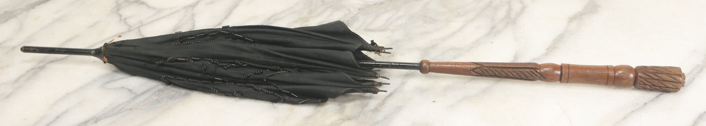 Lot 016 - Antique Petite Size Black Beaded Parasol Umbrella With Carved Wooden Handle, Note Holes, Wear, Overall Length 22-1/4"