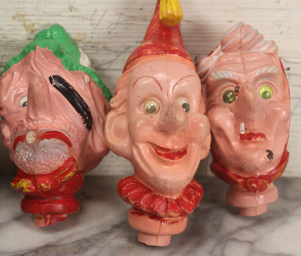 Lot 029 - Grouping Of Five Vintage Punch And Judy Style Rubber Puppet Heads Including Devil, Pirate, Cop, And Others