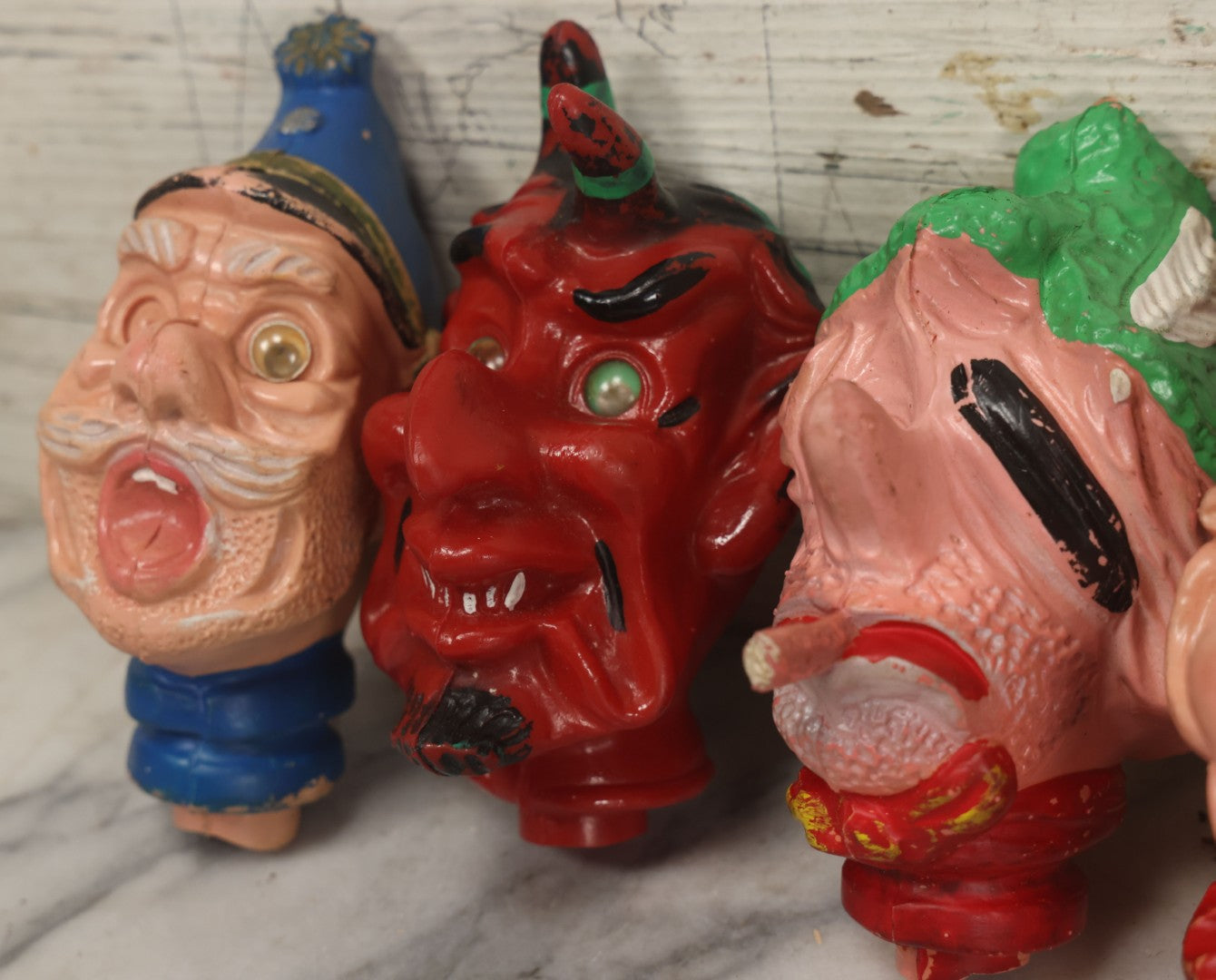 Lot 029 - Grouping Of Five Vintage Punch And Judy Style Rubber Puppet Heads Including Devil, Pirate, Cop, And Others