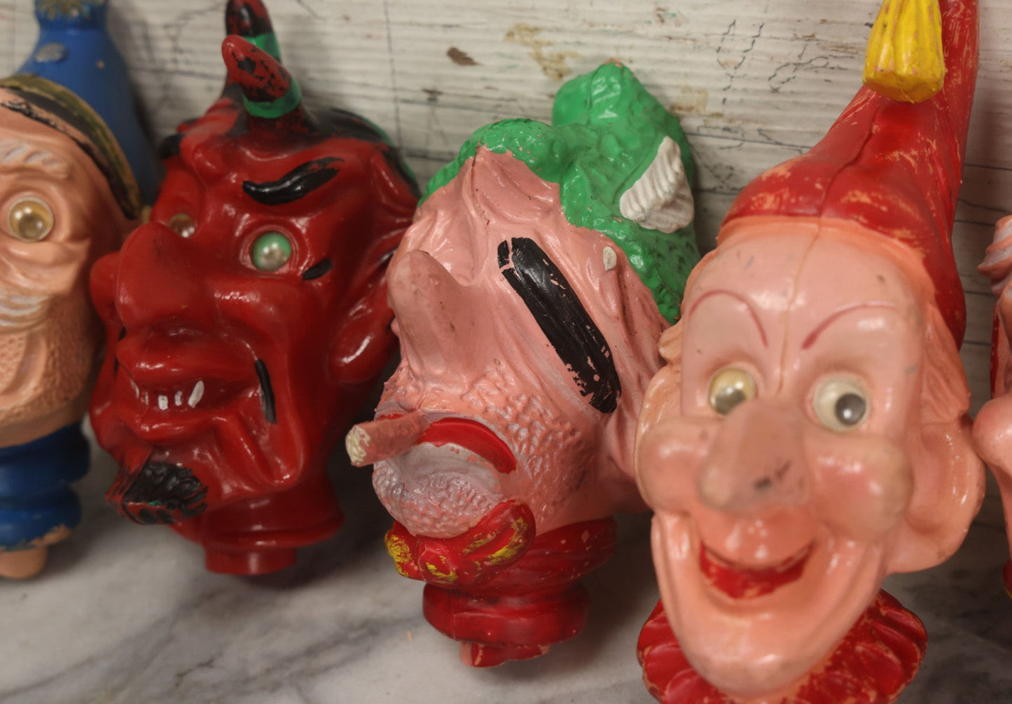 Lot 029 - Grouping Of Five Vintage Punch And Judy Style Rubber Puppet Heads Including Devil, Pirate, Cop, And Others