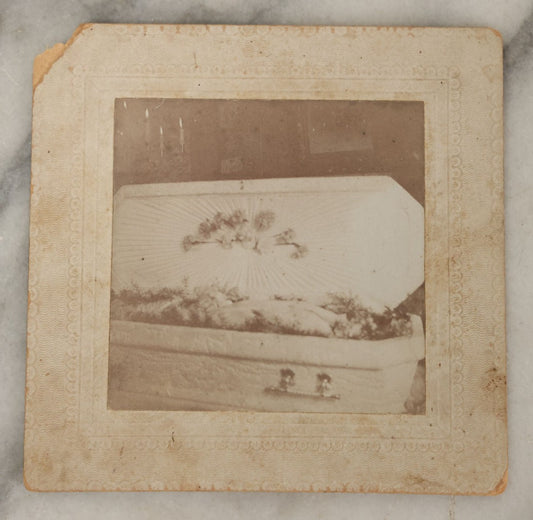 Lot 050 - Antique Boarded Photograph Of An Open Casket Funeral With A White Coffin, Corpse Not Visible, Identified On Verso As Mable McCloud