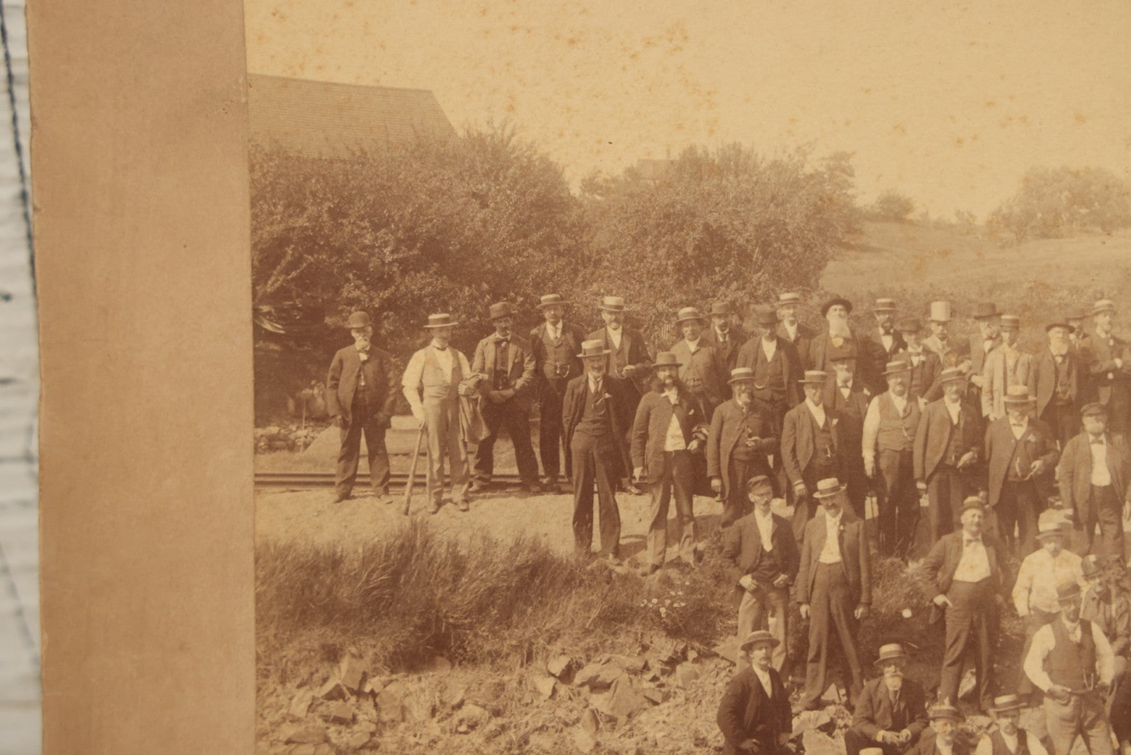 Lot 064 - Antique Photograph Of A Large Group Of Men Posing Next To The Dover Point Trestle Railroad Train Bridge, Dover, New Hampshire, With Detailed Identification On Verso, 1892