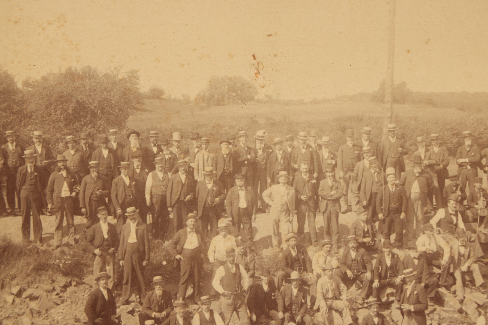Lot 064 - Antique Photograph Of A Large Group Of Men Posing Next To The Dover Point Trestle Railroad Train Bridge, Dover, New Hampshire, With Detailed Identification On Verso, 1892