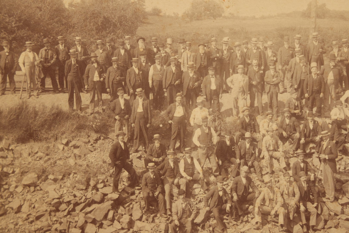Lot 064 - Antique Photograph Of A Large Group Of Men Posing Next To The Dover Point Trestle Railroad Train Bridge, Dover, New Hampshire, With Detailed Identification On Verso, 1892