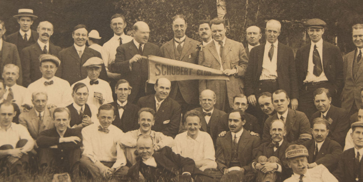 Lot 065 - Antique Boarded Photograph Of The Men Of The Schubert Club, Holding A Pennant, Man With Schubert Hat, Likely The Music Organization Of Saint Paul, Minnesota