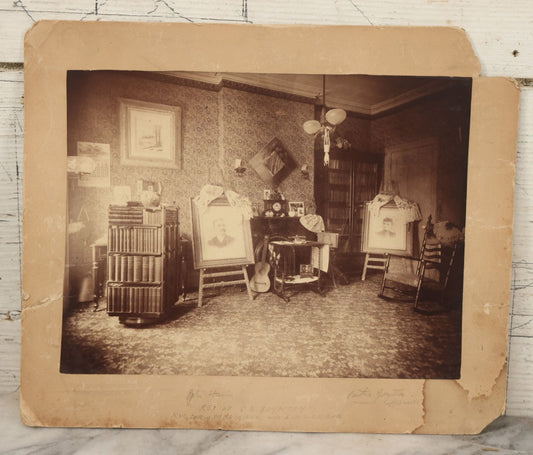 Lot 068 - Antique Boarded Interior Photograph Of The Living Room Of Charles And Elvira Boynton, With Photographs Of John Haines And Bertha Boynton Haines Displayed Along With Artwork, Instruments, Etc