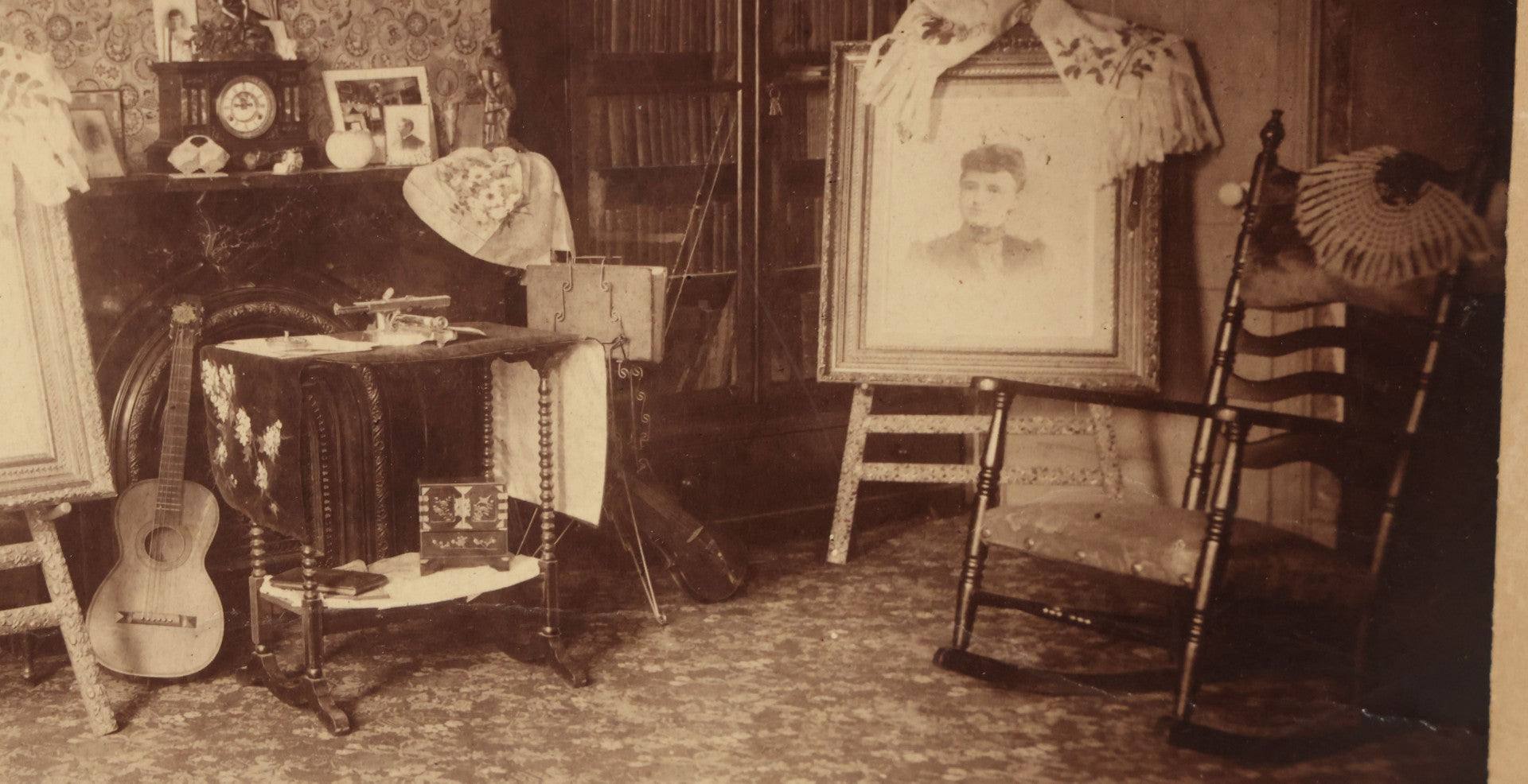 Lot 068 - Antique Boarded Interior Photograph Of The Living Room Of Charles And Elvira Boynton, With Photographs Of John Haines And Bertha Boynton Haines Displayed Along With Artwork, Instruments, Etc