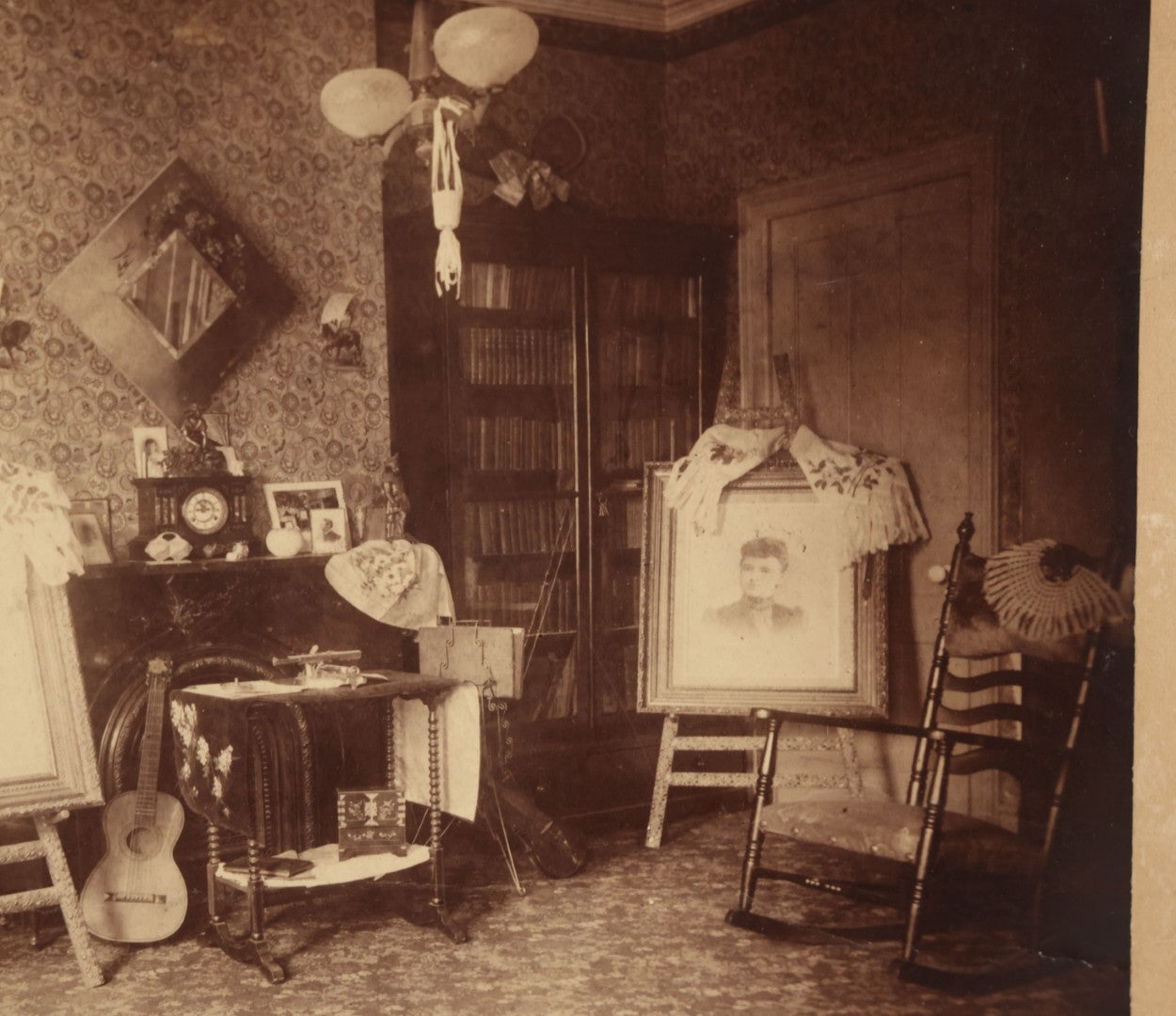 Lot 068 - Antique Boarded Interior Photograph Of The Living Room Of Charles And Elvira Boynton, With Photographs Of John Haines And Bertha Boynton Haines Displayed Along With Artwork, Instruments, Etc