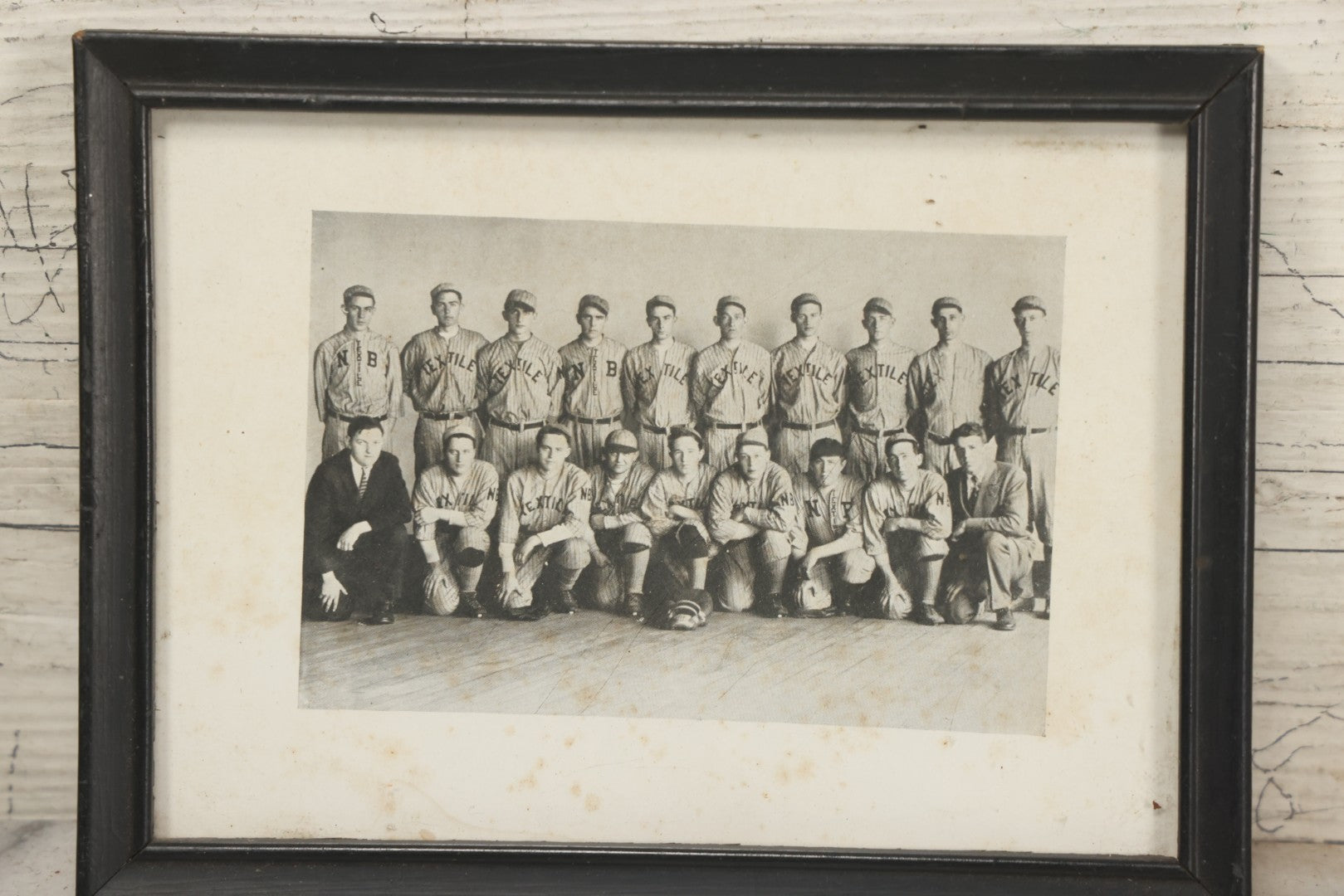 Lot 069 - Antique Framed Photograph Of A Baseball Team With Jerseys Marked "N.B. Textile" Likely Referring To New Bedford, Massachusetts, 7-3/4" x 5-7/8"