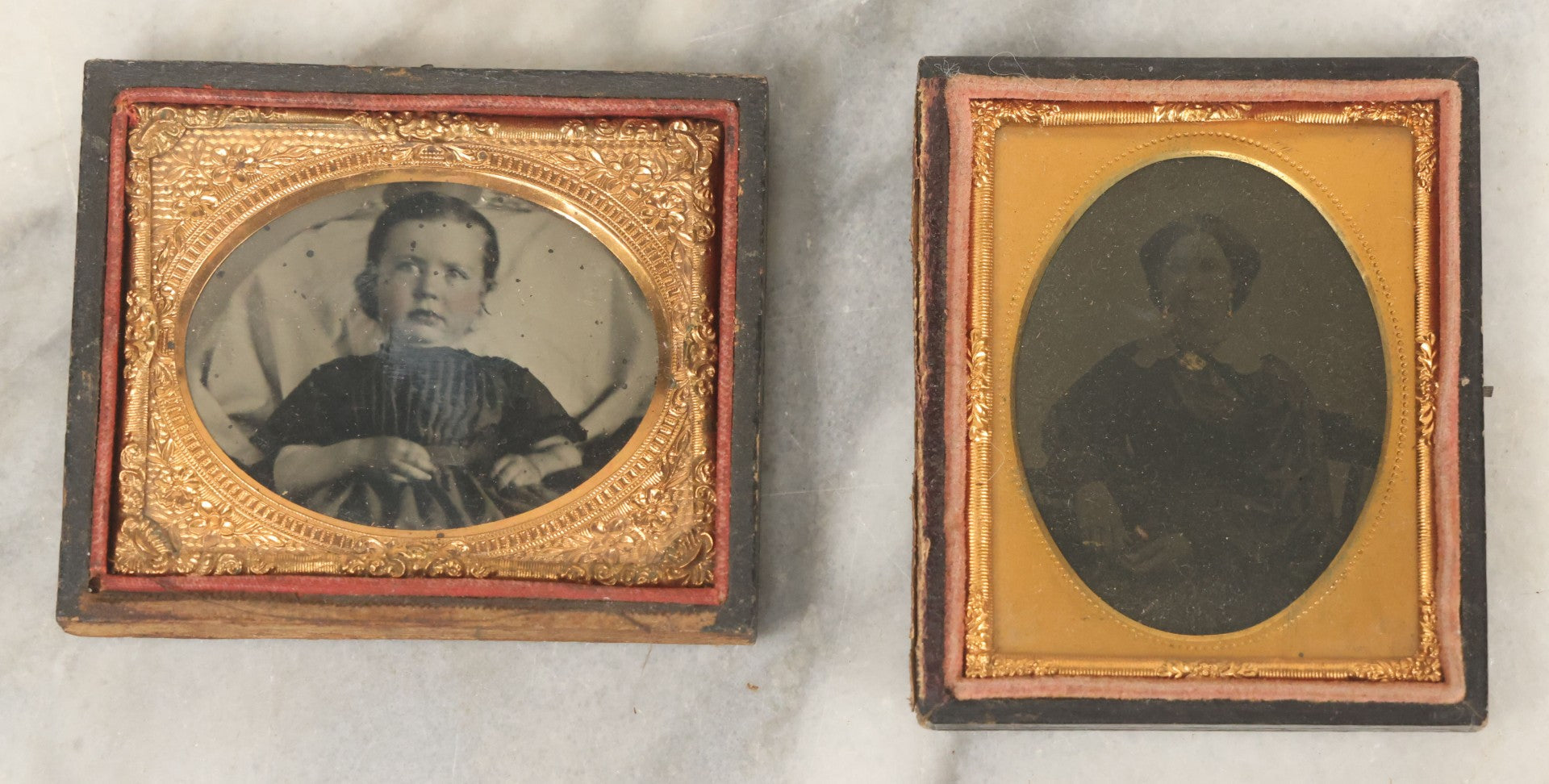 Lot 071 - Pair Of Antique 1/9th Plate Cased Images Including Hidden Mother Ruby Ambrotype With Young Child And Very Dark Tintype Of A Woman, In Half Leatherette Union Cases