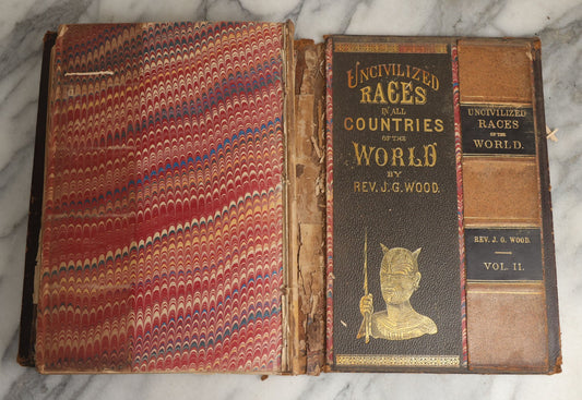 Lot 079 - "The Uncivilized Races Of Men" Antique Dummy Salesman Sample Book By Reverend J.G. Wood, J.B. Burr And Company, Publishers, 1875, Hartford, Profusely Illustrated, Two Volumes In One, Note Poor Binding Condition
