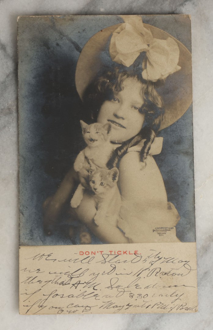 Lot 081 - Grouping Of Ten Antique And Vintage Photographic Postcards Of Women Including Girl With Cats, Woman In Costume, And Woman In Swimsuit, Etc., (Grouping A)