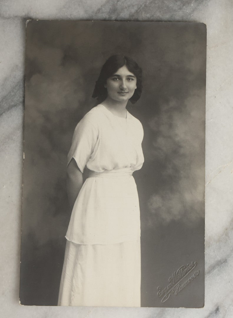 Lot 081 - Grouping Of Ten Antique And Vintage Photographic Postcards Of Women Including Girl With Cats, Woman In Costume, And Woman In Swimsuit, Etc., (Grouping A)